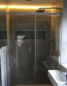 Warm white LEDs brighten this shower room