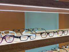 10-watt LED strip-lights installed under shelves to enhance product display