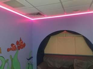 RGB lights set to rose colour in a Portland school calm room