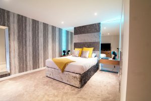 Bedroom RGBW LED highlights set to cyan