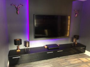 The finished cinema room, with TV media panel - view 2