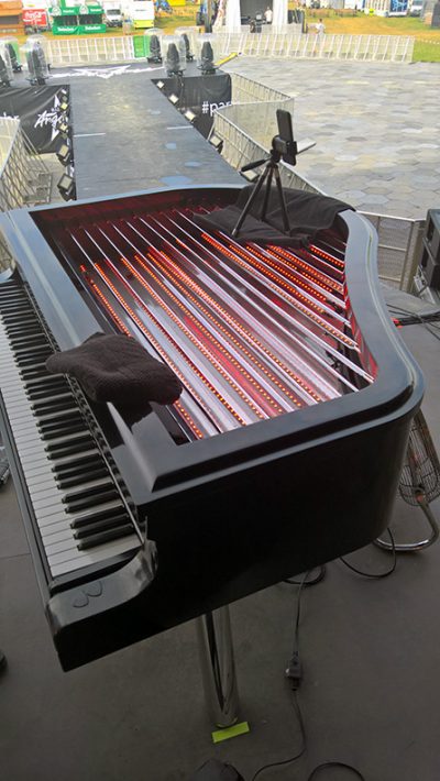 Setting up the piano on tour