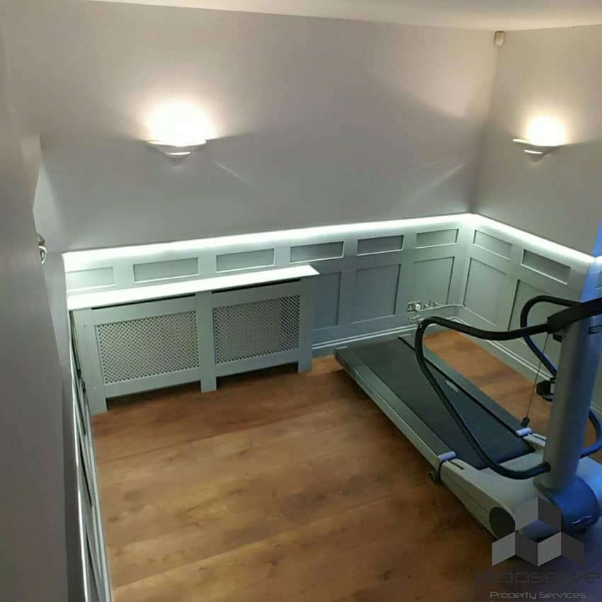during a room transformation with Treadmill, paneling and LED Tape has been installed