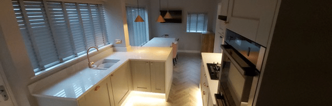 Kitchen cupboards lit up using LED Tape in white